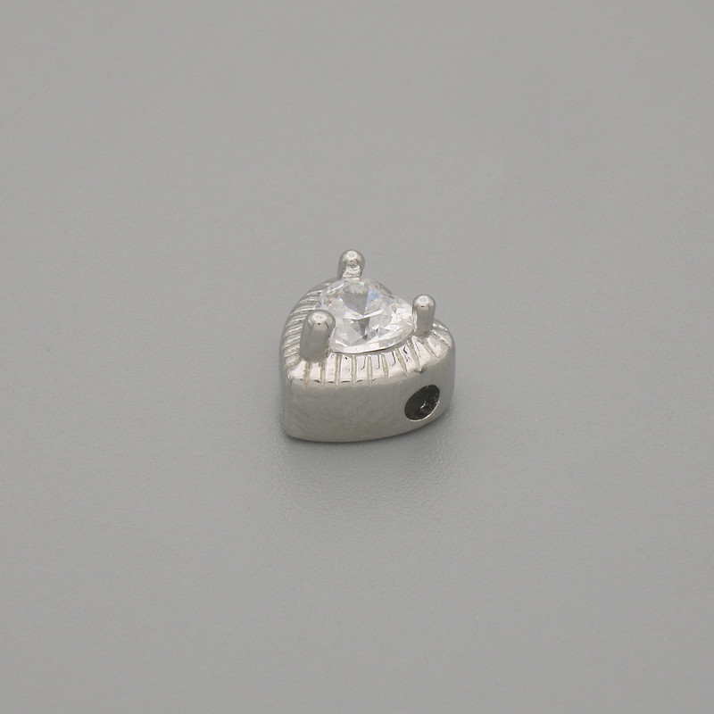 Koralik-wkładka w kształcie serca, kolor metalu: srebrny, średnica 6,5×6,5 mm ± otwór o średnicy 1,3 mm ± za 1 szt.
