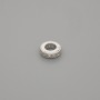 Koralik-wstawka o kolorze metalu srebrnym, średnica 5,5×2 mm ± otwór 3,5 mm ± za 1 szt.