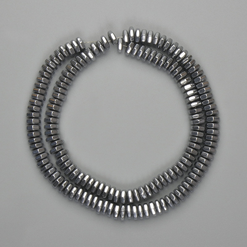 Koraliki hematytu fasetowane w kształcie rondla 6x2 mm+- kolor srebrny, długość 38 cm+