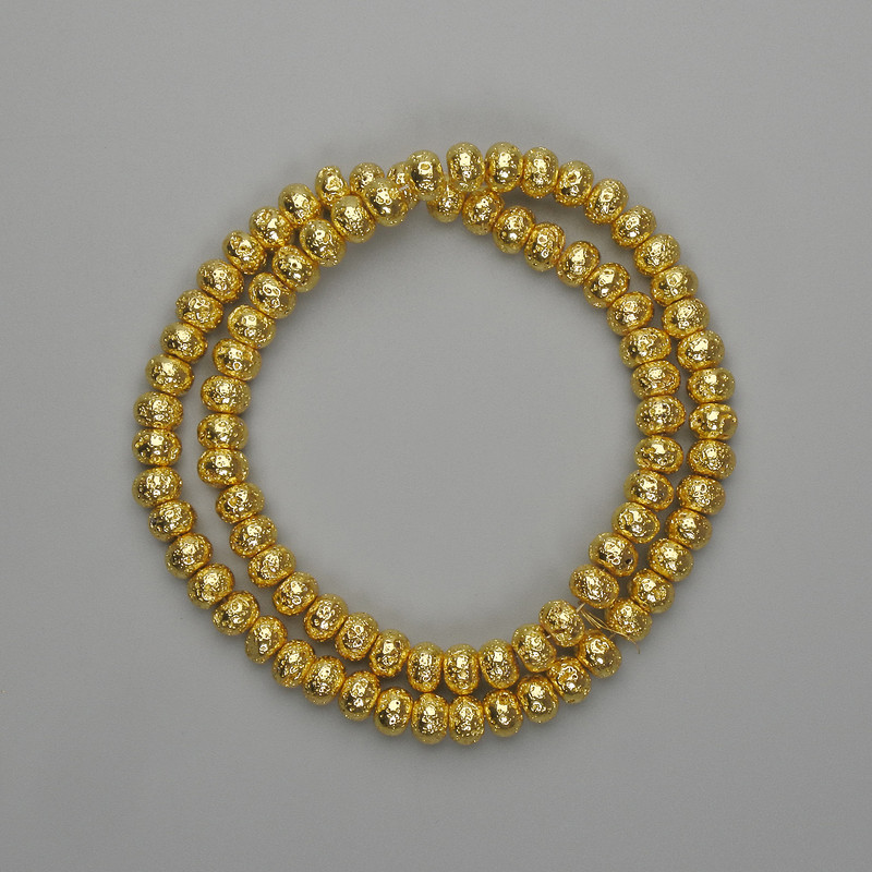 Koraliki z lawy z złotą metaliczną powłoką, porowaty rondel 6×4,5 mm, długość 38 cm ±