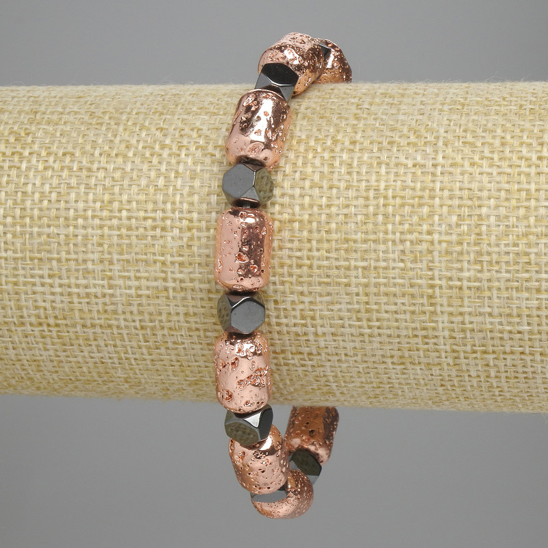 Bransoletka z lawy wulkanicznej, kolor miedziowy, cylindryczne koraliki 12×8 mm ±, fasetowany hematyt 5,5×6 mm ±, długość 18 cm ±, na elastycznej gumce