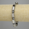 Bransoletka z lawy cylindryczna, jasnosrebrny kolor 12×8 mm ± hematyt fasetowany 5,5×6 mm ± długość 18 cm ± elastyczna