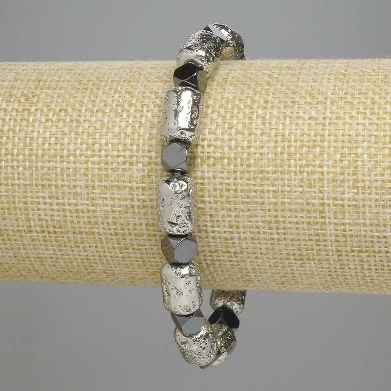 Bransoletka z lawy cylindryczna, jasnosrebrny kolor 12×8 mm ± hematyt fasetowany 5,5×6 mm ± długość 18 cm ± elastyczna
