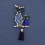 Broszka-wisiorek Sowa z kamieniem kocie oko, strass, metal w kolorze srebra, średnica 24 mm, długość 50 mm