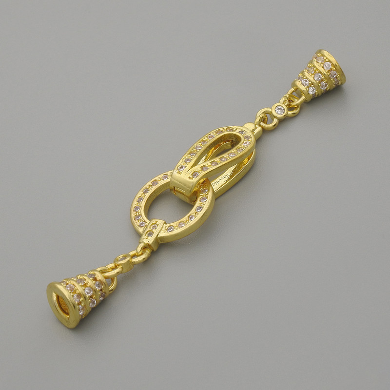 Zapięcie zakończeniowe w kolorze złota ze cyrkoniami, średnica 20×11 mm, długość około 52 mm