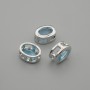 Koralik-wstawka z błękitnym kryształem, kolor metalu: srebrny, owalny, średnica 9×7 mm, otwór średnicy około 1,3 mm, za 1 szt. +