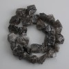 Koraliki z topazu dymnego, nieobrobione kamienie, średnica 15–20×8–20 mm, długość 40 cm ±
