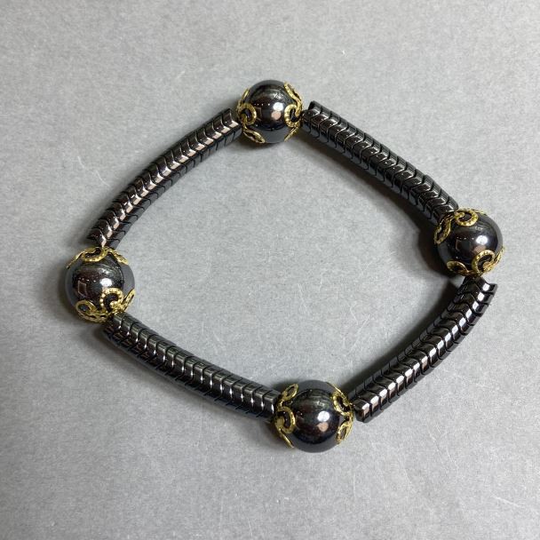 Bransoletka hematit «Fala» 6×2 mm +- gładka kuleczka 12 mm +-, długość 18 cm, elastyczna