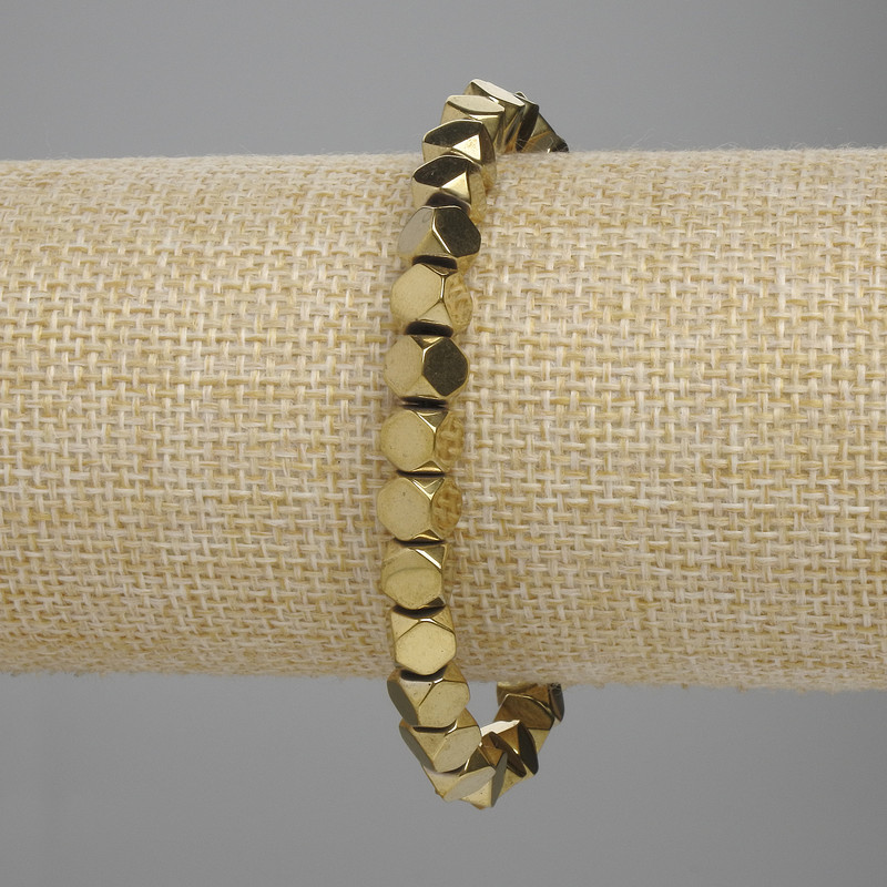 Bransoletka z hematytu, fasetowane kamienie 5,5×5,5 mm ±, kolor złocisty, długość około 18 cm, na elastycznej gumce