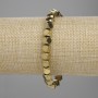 Bransoletka z hematytu, fasetowane kamienie 5,5×5,5 mm ±, kolor złocisty, długość około 18 cm, na elastycznej gumce