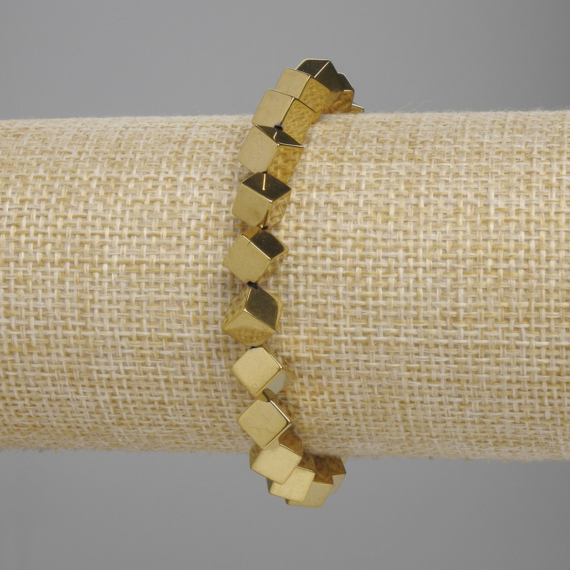 Bransoletka z hematytu – kostki z poprzecznym otworem, 5×5 mm, kolor złocisty, długość ok. 18 cm, elastyczna