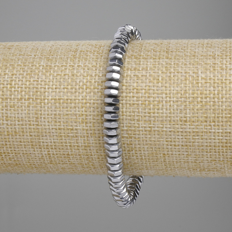 Bransoletka z hematytu fasetowanego, średnica 6×2 mm, kolor srebrny, długość 18 cm, na elastycznej gumce