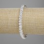 Bransoletka z lawy wulkanicznej ze srebrzystym metalicznym napylaniem, porowate rondelki 6×4,5 mm, długość 18 cm +/- elastyczna