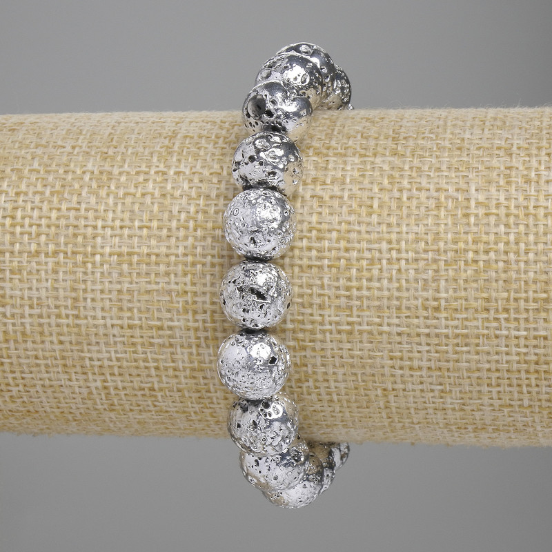 Bransoleta z lawy z srebrzystym metalicznym pokryciem, porowata kulka 10,5 mm, długość 18 cm, elastyczna