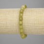 Bransoletka z chryzolitu (olwin) - fasetowane kuleczki, średnica około 7,5 mm, długość 18 cm, elastyczna żyłka