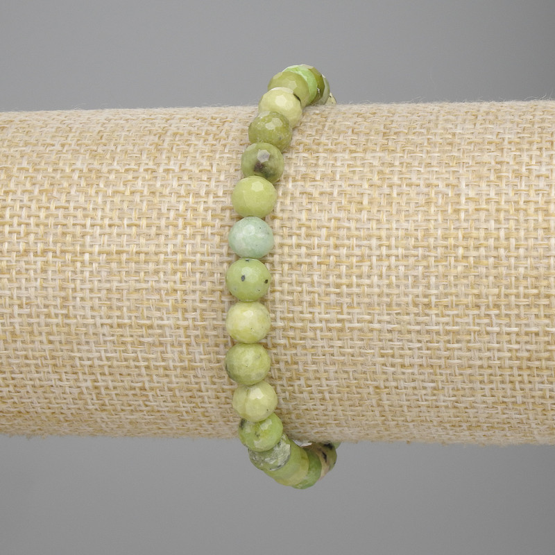 Bransoletka z jadeitu, fasetowana kulka, średnica 6 mm ±, długość 18 cm ±, na elastycznej gumce