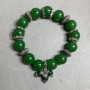 Bransoletka z chryzoprazem — gładkie kuleczki o średnicy około 12 mm, z metalowymi wstawkami, długość 18 cm+- elastyczna