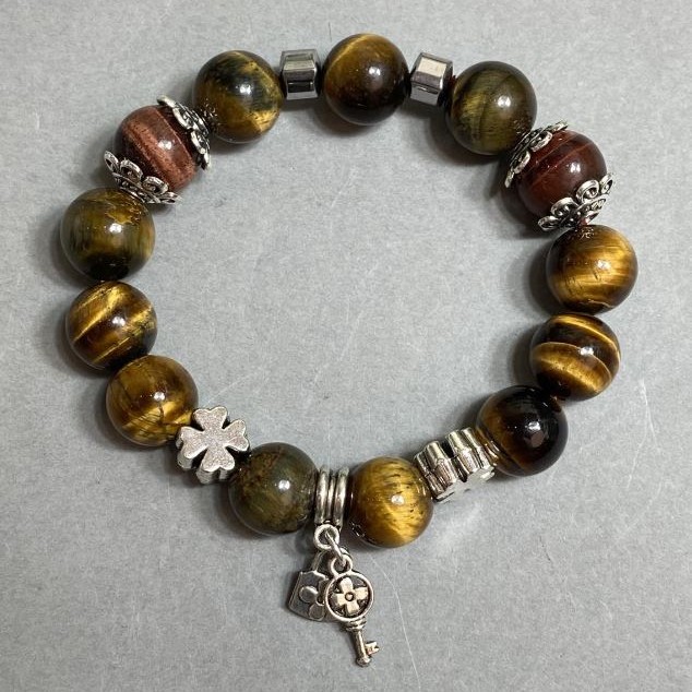 Bransoletka z tygrzego oka i byczego oka, gładka kuleczka 12 mm +/- z metalowymi wstawkami, długość 18 cm +/- elastyczna