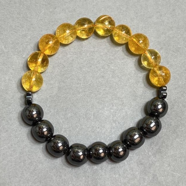 Bransoleta z cytryną i hematitem — gładkie kulki 10 mm ±, Chanel 8×6 mm ±, długość 18 cm ±, elastyczna