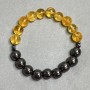 Bransoleta z cytryną i hematitem — gładkie kulki 10 mm ±, Chanel 8×6 mm ±, długość 18 cm ±, elastyczna