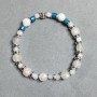 Bransoletka z howlitem – kuleczki 8 mm ±, fasetowane kostki górskiego kryształu 4 mm ±, 7 mm ±, z wstawkami, długość 18 cm ±, elastyczna