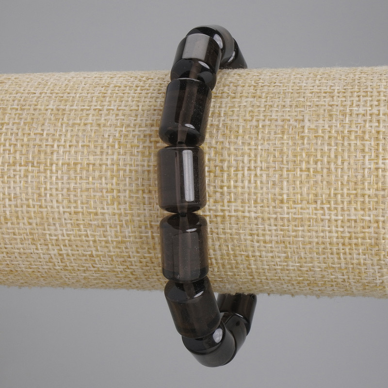 Bransoleta z topazem dymnym w cylindrycznym kształcie, średnica 15×10 mm ±, długość 18 cm ±, elastyczna