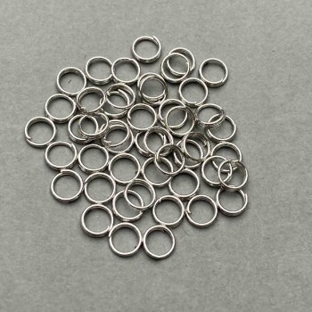 Furnitura jubilerska: pierścień sprężynowy, średnica 6 mm, srebrny metal, opakowanie 20 g