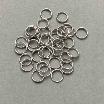Akcesoria jubilerskie - pierścień łączący sprężynowy, średnica 7 mm, srebrzysty metal, opakowanie 1 kg