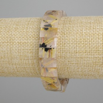 Bransoletka z naturalnego kamienia: kwarc rutylowy włochaty, gładkie ogniwa, średnica 12×7–8 mm, długość ok. 18 cm, elastyczna