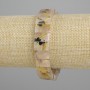 Bransoletka z naturalnego kamienia: kwarc rutylowy włochaty, gładkie ogniwa, średnica 12×7–8 mm, długość ok. 18 cm, elastyczna