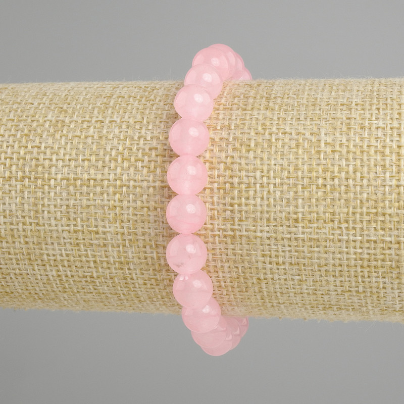 Bransoletka z różowego kwarcu, gładka kulka, średnica 8 mm ±, długość 18 cm ±, na elastycznej gumce