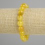 Bransoletka z żółtego agatu — gładkie kuleczki o średnicy około 10 mm, długość 18 cm ±, na elastycznej gumce