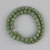 Koraliki z zielonej lawy wulkanicznej cylindryczne, średnica 8×8 mm, na żyłce jubilerskiej, długość 38 cm+