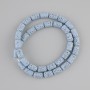 Koraliki cylindryczne z błękitnej lawy wulkanicznej, średnica 10×6 mm ± na nitce, długość 38 cm+
