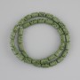 Koraliki z zielonej lawy wulkanicznej, cylindryczne, o średnicy 10×6 mm, na żyłce jubilerskiej, długość 38 cm+