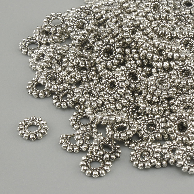 Koralik-wkładka kolor metalu: srebro, średnica 6 mm, otwór 2,5 mm ±, opakowanie 20 g (~170 szt.)