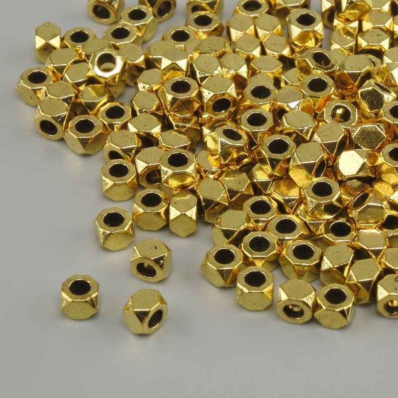Złocone koraliki-wstawki w kolorze złota, średnica 3×2,5 mm, otwór około 1,9 mm, opakowanie 20 g (~170 szt.)