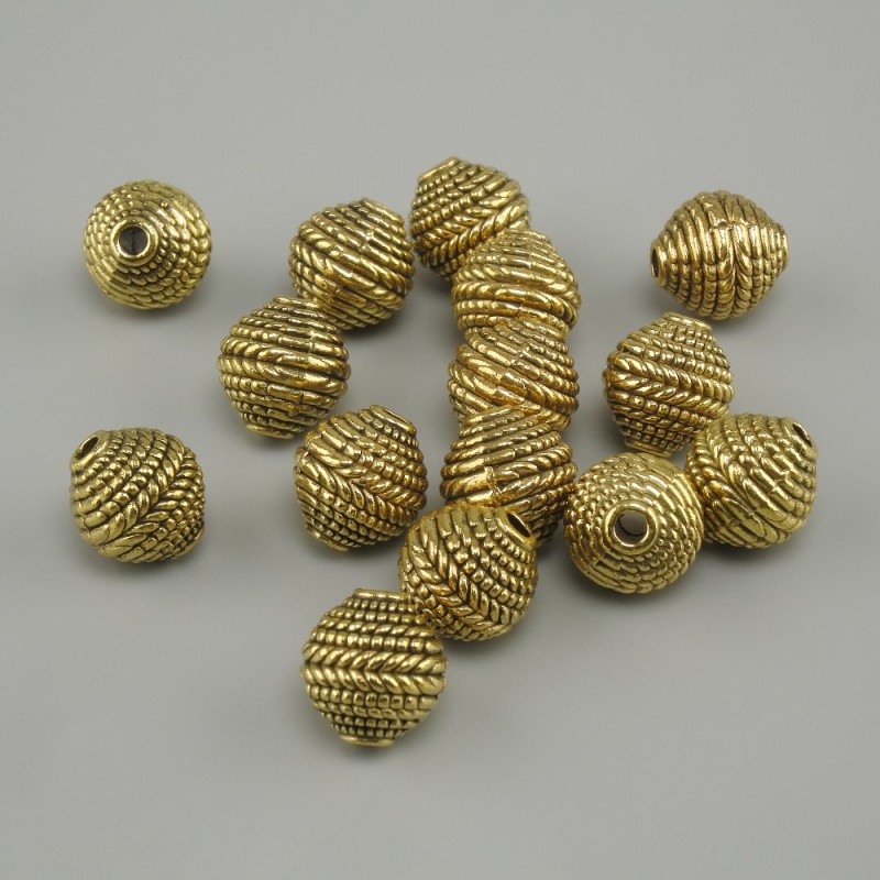 Furnitura jubilerska — wkładka koralikowa w kolorze żółtego złota, średnica 8×7,5 mm, otwór 1,8 mm, opakowanie 20 g (~15 szt.)