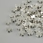 Koralik-wstawka w kształcie krzyża, kolor metalu srebrny, średnica 6×6 mm, otwór 1,8 mm, opakowanie 20 g (~68 szt.)