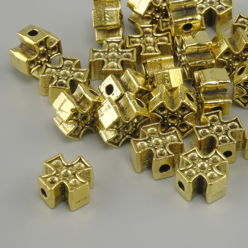 Koralik-wkładka w kształcie krzyża, kolor metalu: złoto żółte, wymiary 8×8 mm ± otwór Ø 2 mm ± opakowanie 20 g (~25 szt.)