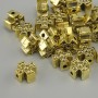 Koralik-wkładka w kształcie krzyża, kolor metalu: złoto żółte, wymiary 8×8 mm ± otwór Ø 2 mm ± opakowanie 20 g (~25 szt.)