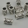 Koralik ozdobny – runa skandynawska, średnica 13×9 mm, otwór 6 mm, srebrzysty kolor metalu, wykończenie. 10 szt.