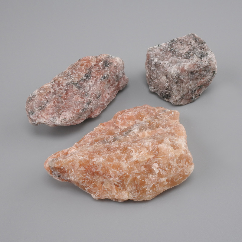 Naturalny nieoszlifowany Słoneczny kamień, średnica 32-67×35-41 mm ± (asortyment rozmiarów) (Cena za 100 g)