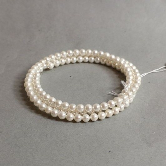 Bransoletka perły Majorka na drucie memory, długość 18cm+