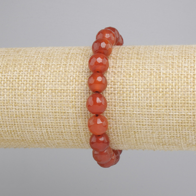 Bransoletka Karneol fasetowana kulka, średnica 10mm+-, długość 18cm+- stretch