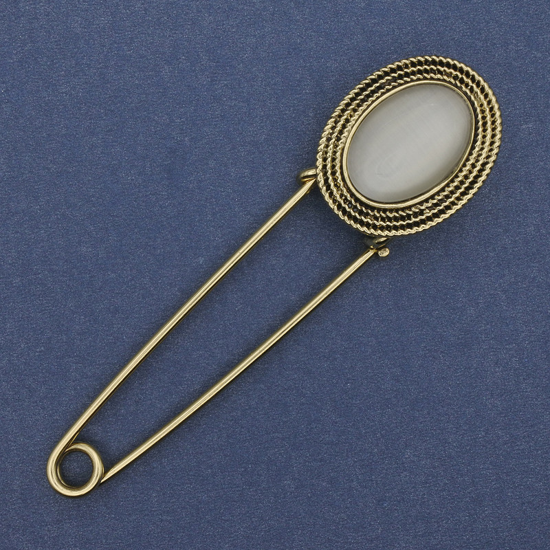 Broszka–spinka z kamieniem kocie oko, metal złocisty 80×22 mm+