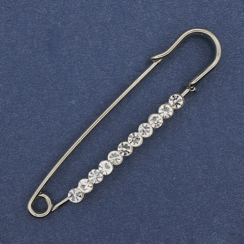 Broszka-spinka z białymi cyrkoniami 60×12 mm ± metal srebrzysty