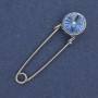 Broszka-spinka z błękitnym kryształem 38x10 mm +/- srebrzysty metal