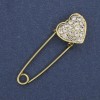 Broszka–szpilka z białymi cyrkoniami 38×12 mm ± złocisty metal