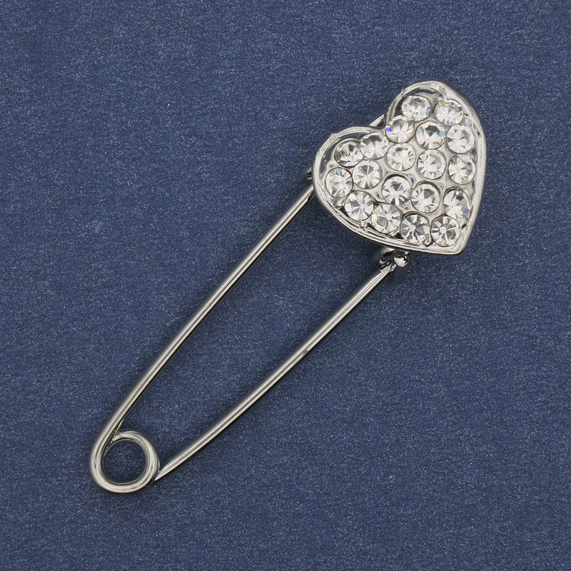 Broszka-spinka z białymi strassami 38×12 mm +- srebrzysty metal